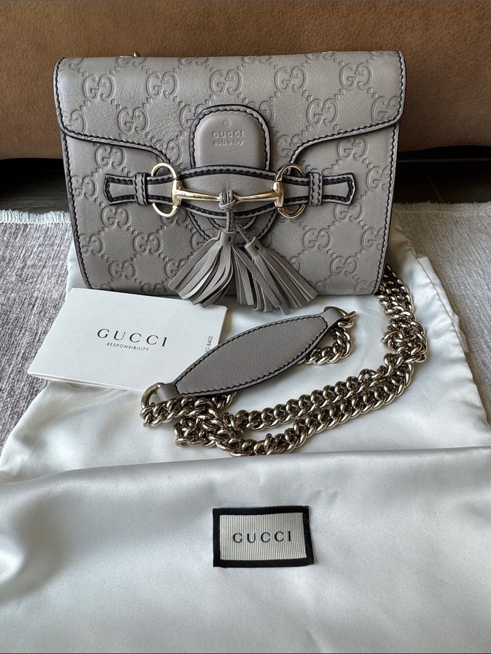 Gucci Guccissima Mini Emily Chain Embossed GG Leather Crossbody Bag